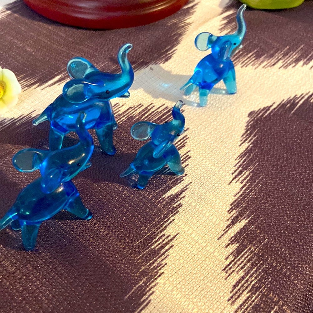 Blue glass miniature elephants